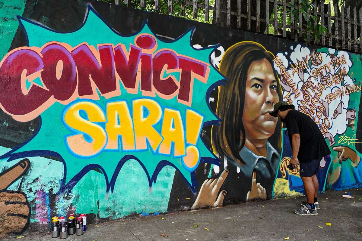 'Convict Sara!' ipininta ng mural artist sa freedom wall ng UP