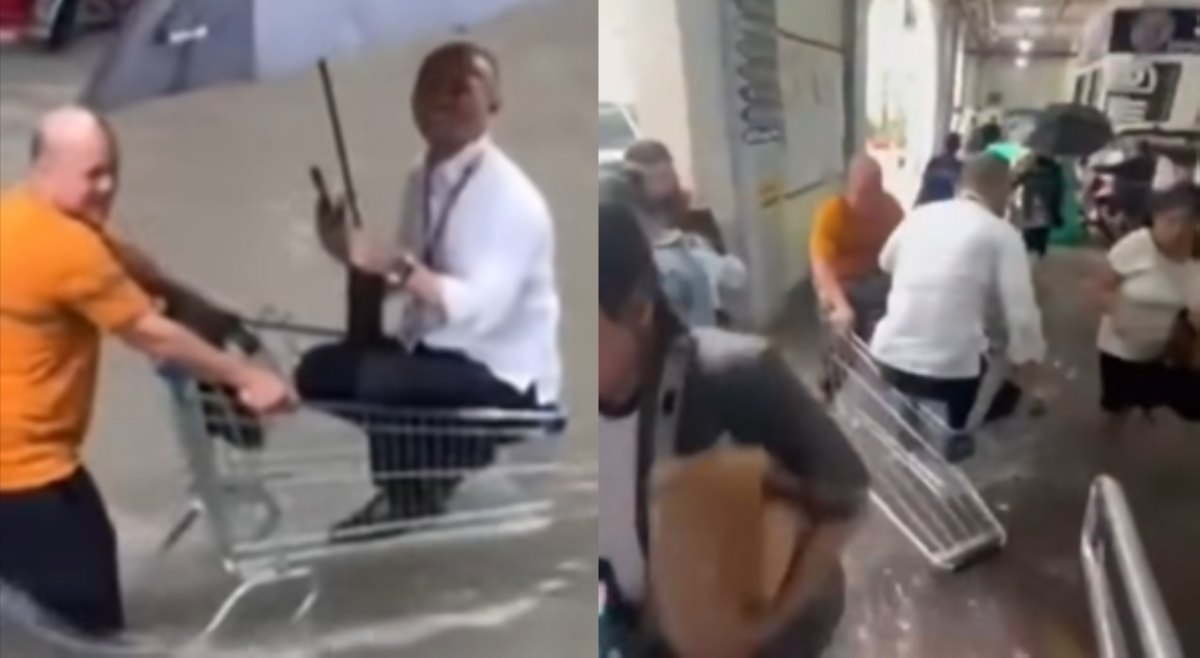 Abogado ng PAO, sumakay sa push cart sa gitna ng baha para makapasok