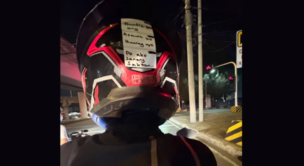 Rider, nagdikit ng pakiusap sa helmet: Buntis po asawa ko, wag n'yo po ako sanang saktan!