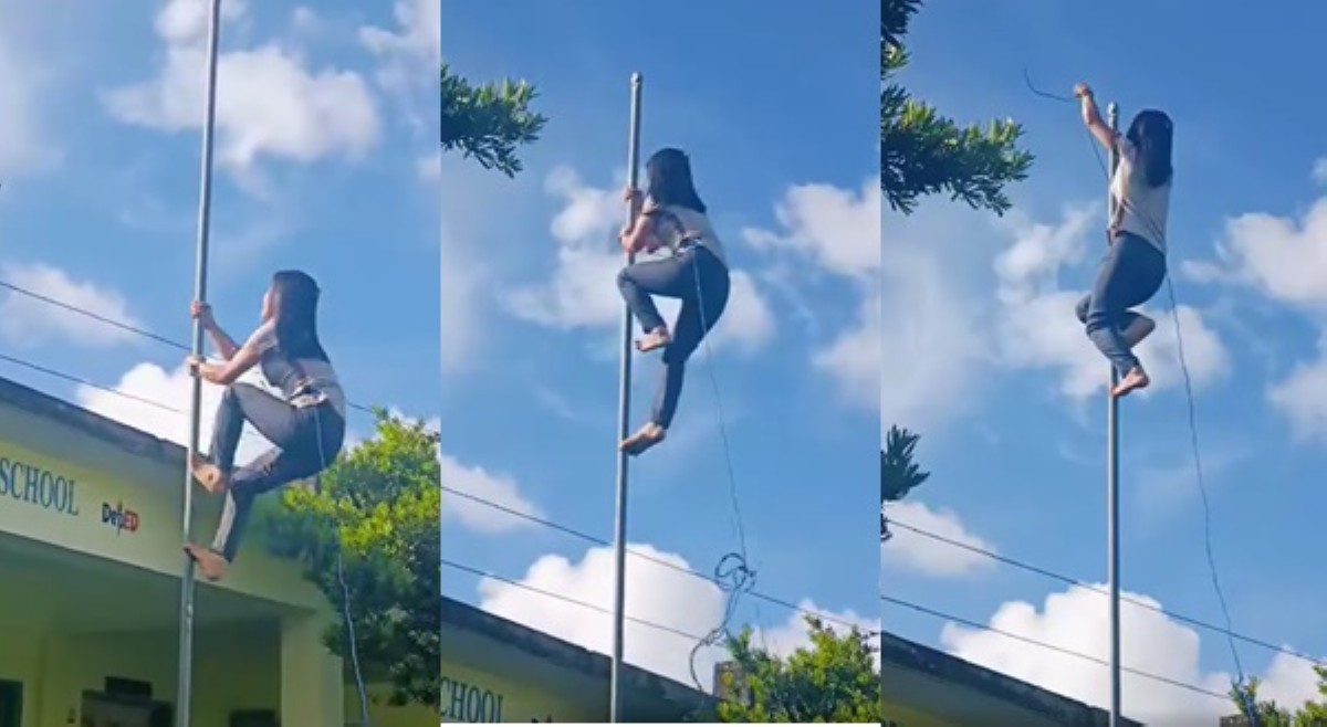 'Buwis-buhay!' Babaeng guro, kinabiliban matapos walang takot na umakyat sa flagpole